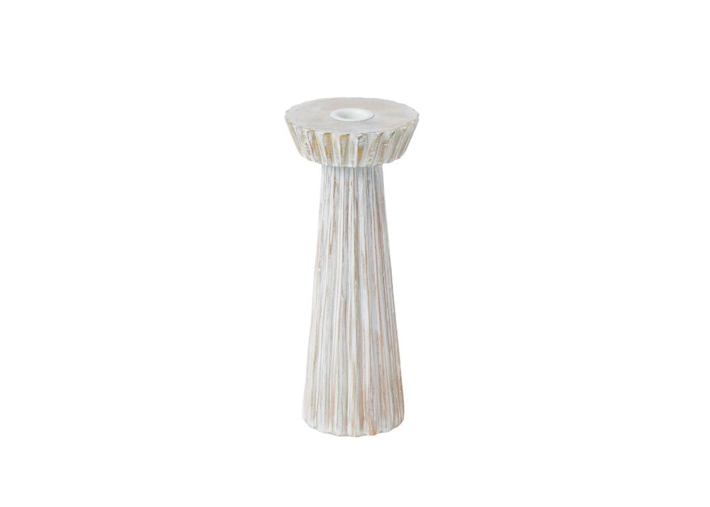A tall ceramic candle holder on a white background.	
