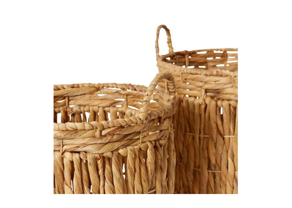 Close up of Two rattan baskets on a white background.
