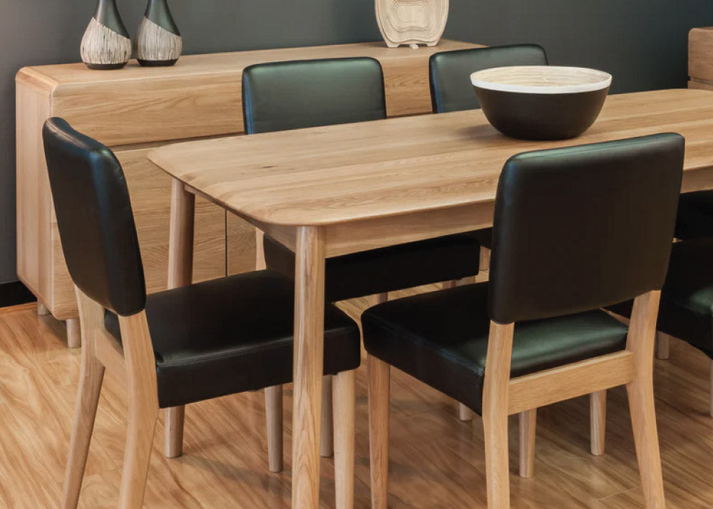 Adele Dining Chair - black leather and American oak close up