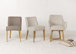grey and cream fabric chairs